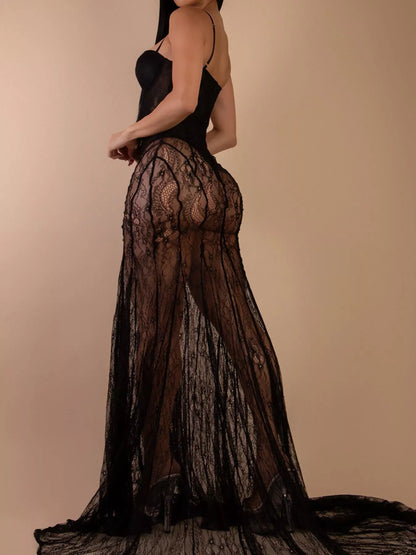 Side view of black sheer lace maxi dress with fitted silhouette and sweetheart neckline